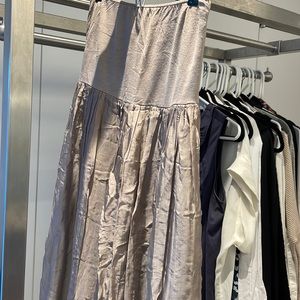 Can be worn as a tube top dress, or skirt.